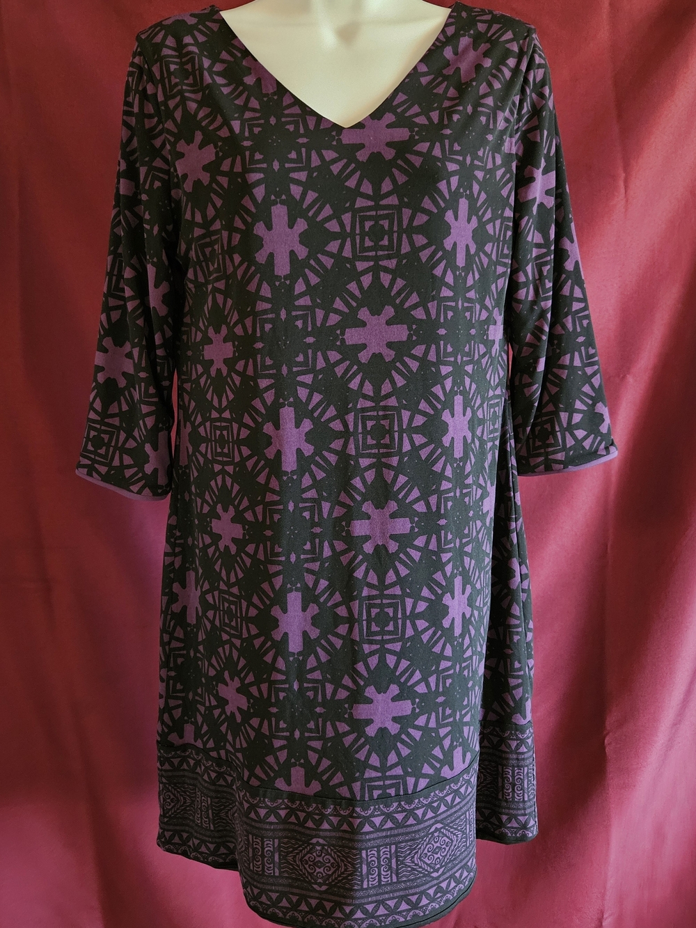 Magnolia Grace V‑Neck Patterned Tunic Dress in Black and Purple
